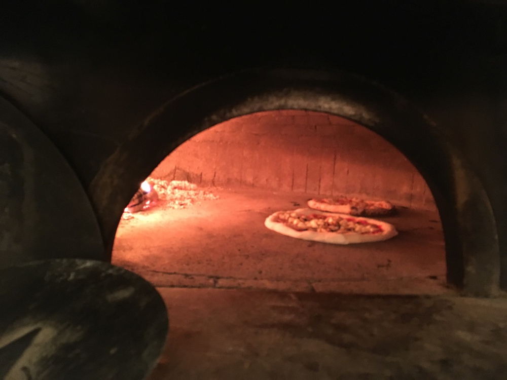 Rome - Pizza class, pizza in the over